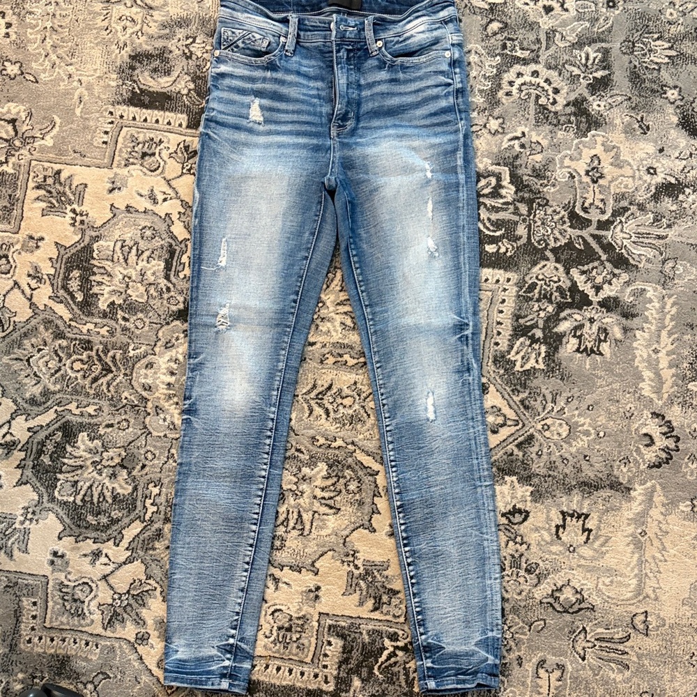 Buckle Light Blue Distressed Skinny Jeans